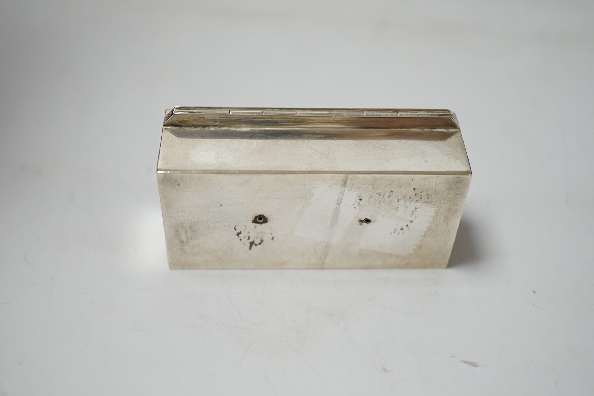 A continental white metal triple compartment rectangular stamp box(ex surmount?), 72mm.